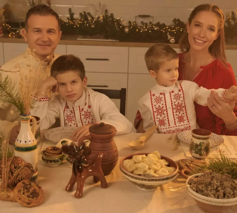 Катерина Осадча з Юрієм Горбуновим та синами у вишиванках за столом з вербою на Вербну неділю