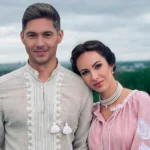 Христина Горняк з партнером у вишиванках на тлі природи