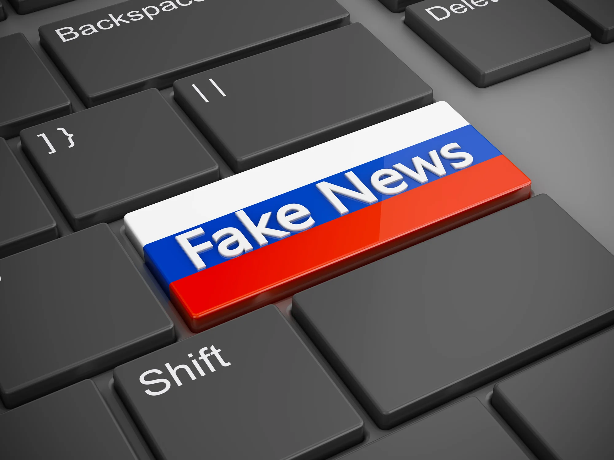 Кнопка Fake News у кольорах прапора Росії символізує дезінформацію Кремля